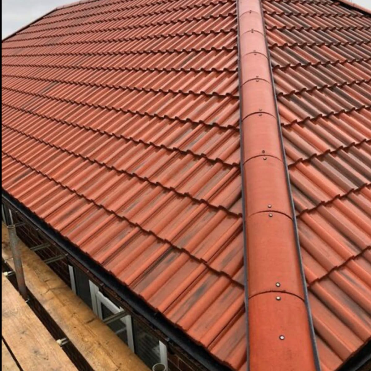 New red tiled roof and ridge